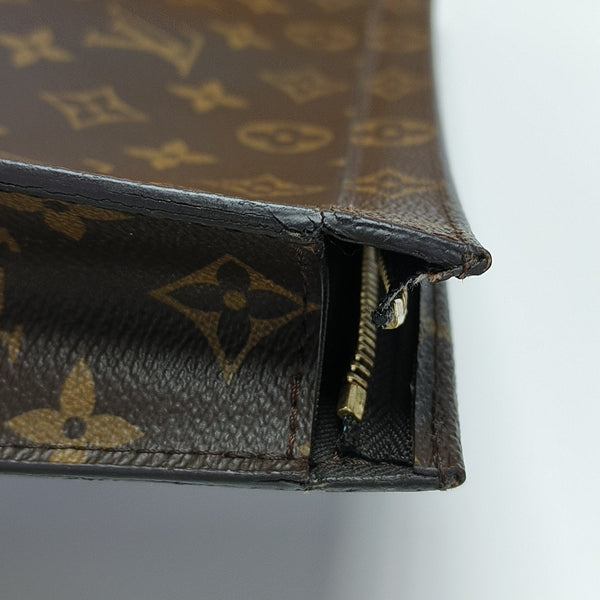Pochette Voyag MM Monogram Coated Canvas Blue