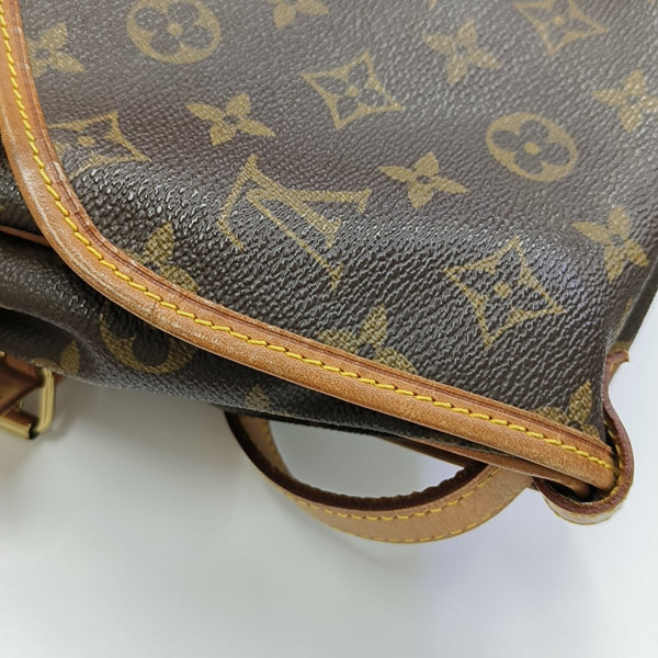 SAUMUR 30 Monogram Coated Canvas Brown