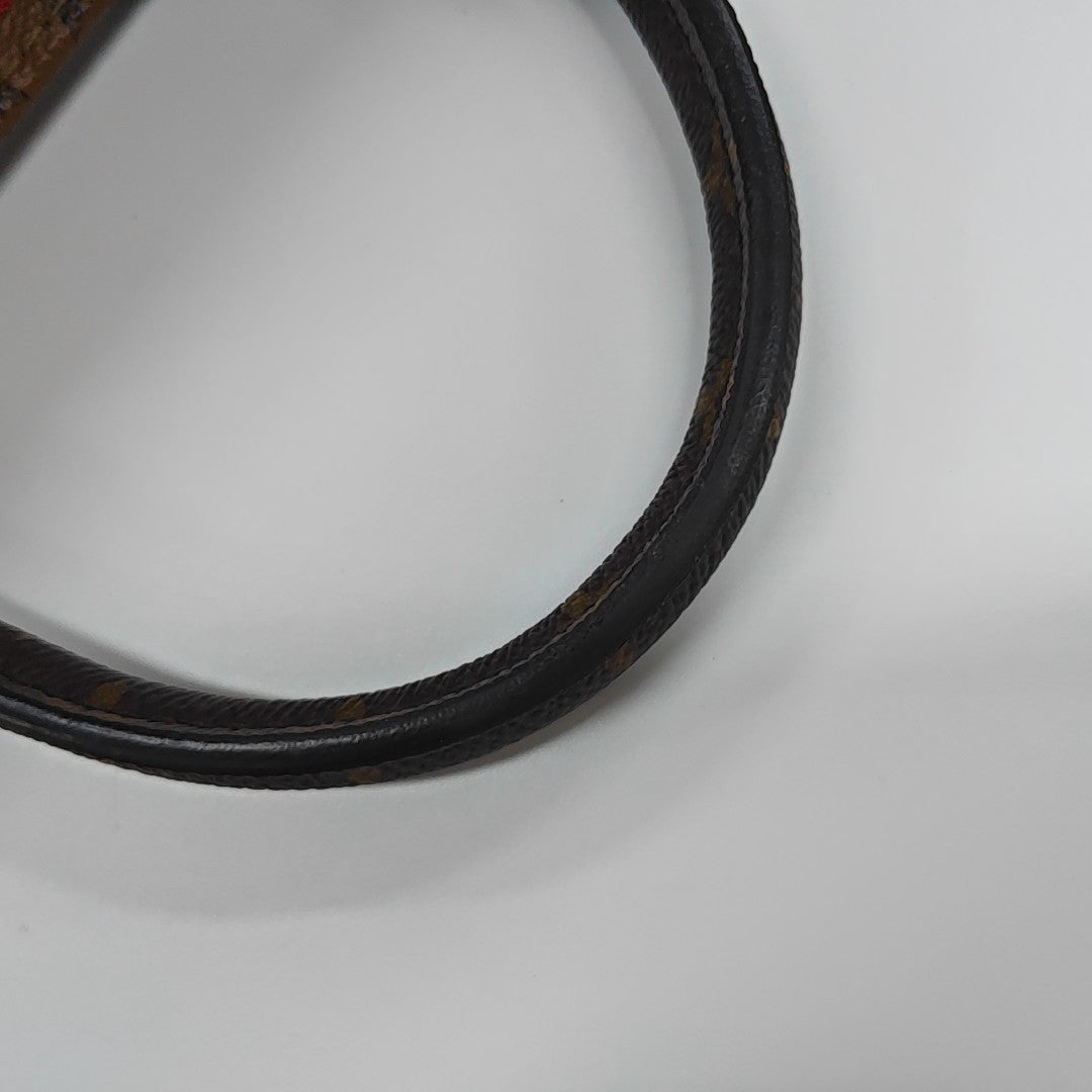 ONTHEGO PM Monogram Coated Canvas Brown