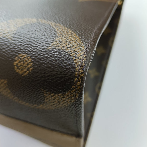 ONTHEGO MM Monogram Coated Canvas Brown