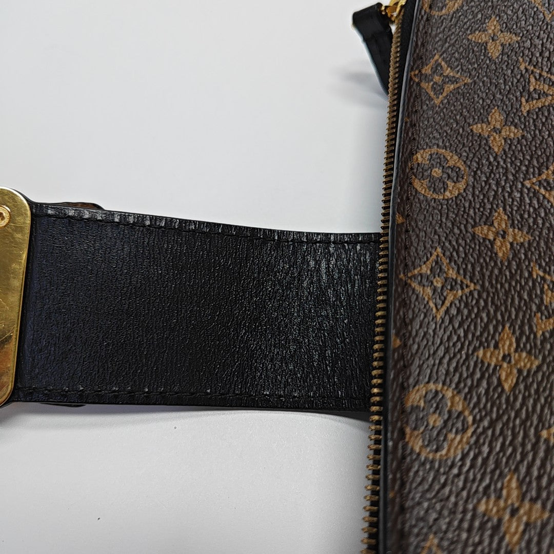 TRUNK Monogram Coated Canvas Brown