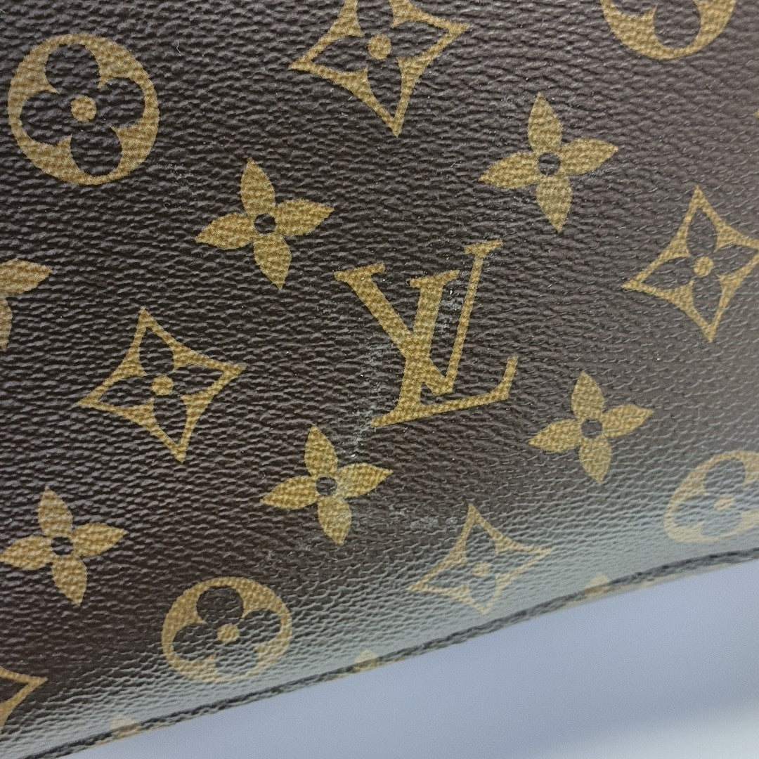 NÉONOÉ MM Monogram Coated Canvas Brown