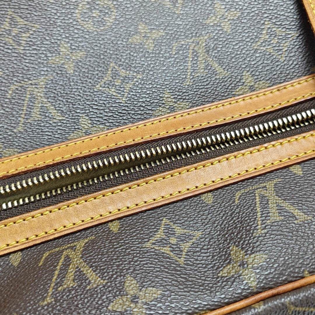 CITE GM Monogram Coated Canvas Brown