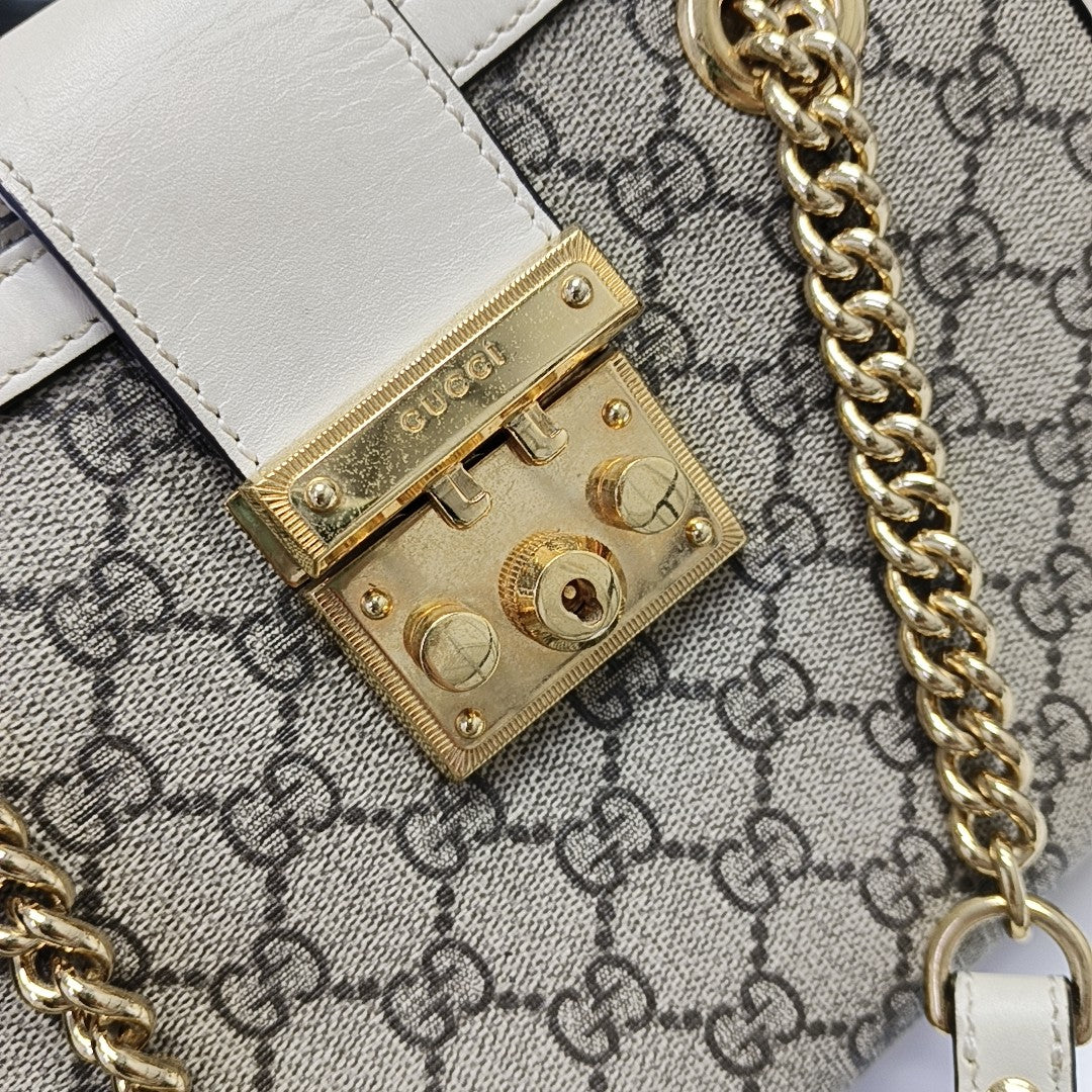 Padlock Small Monogram Coated Canvas Beige