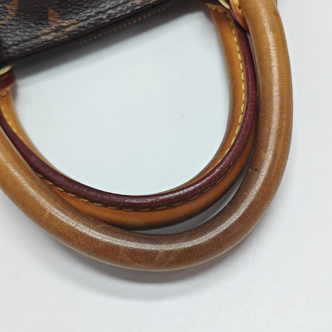 ALMA PM Monogram Coated Canvas Brown