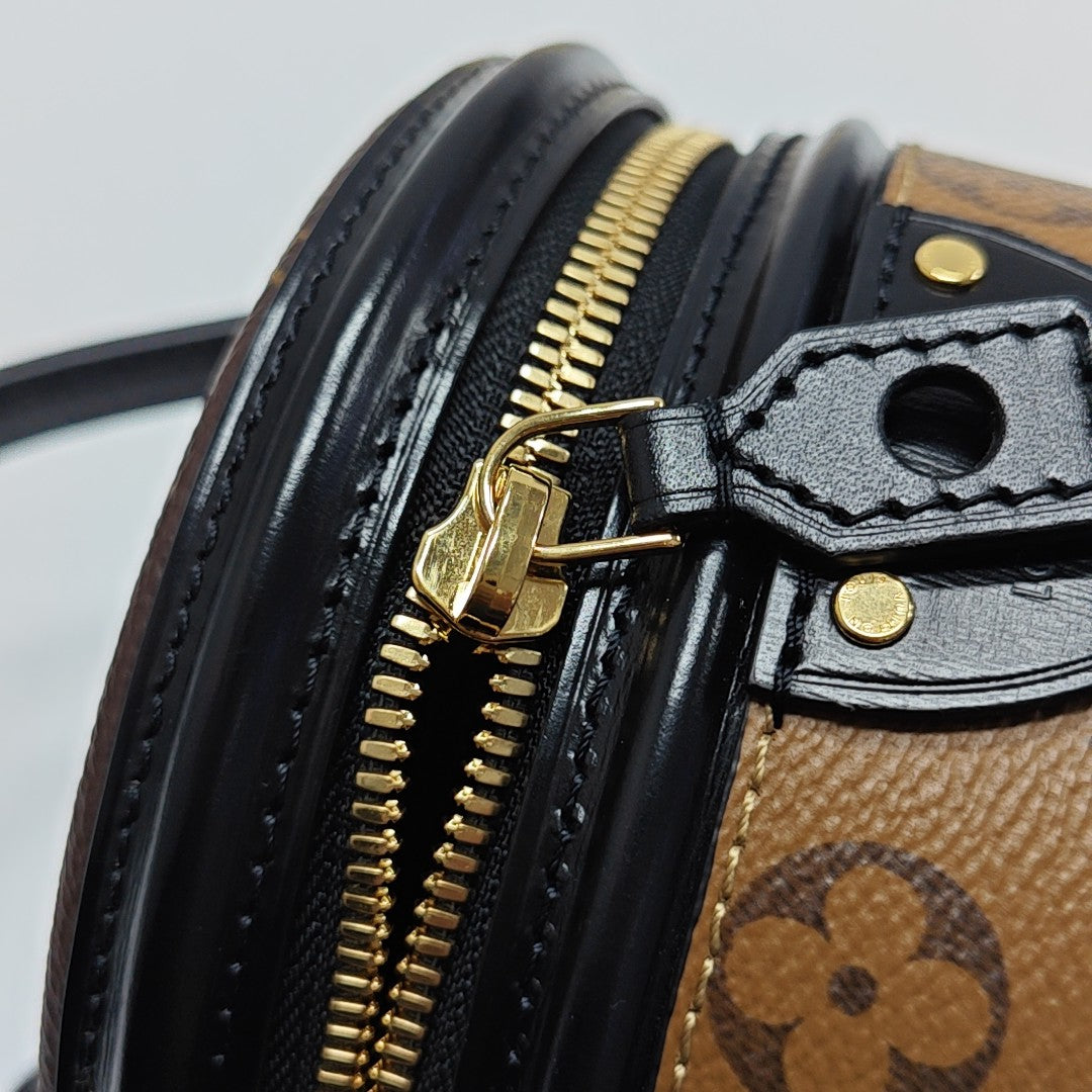CANNES PM Monogram Coated Canvas Brown