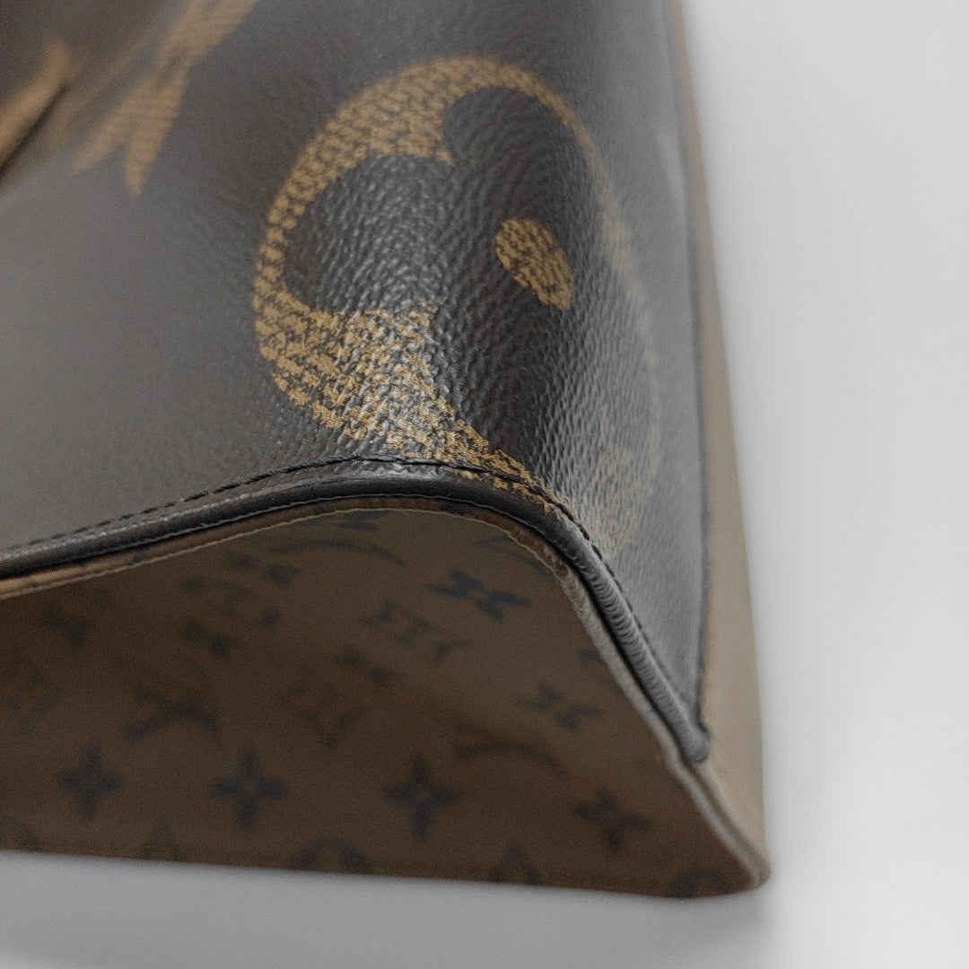 ONTHEGO MM Monogram Coated Canvas Brown