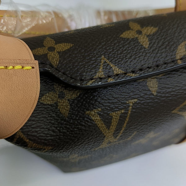 Pochette Mia Monogram Coated Canvas Brown
