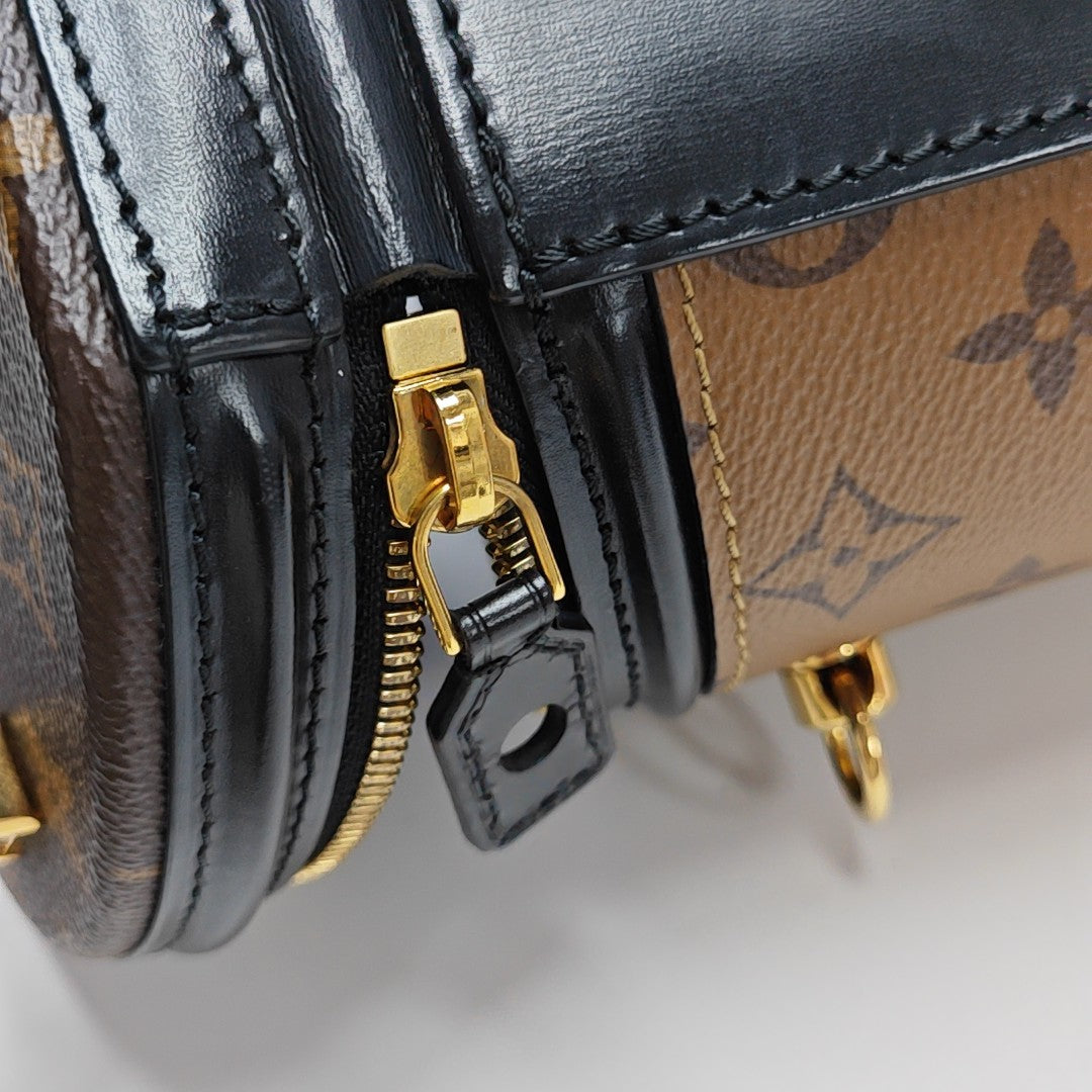 CANNES PM Monogram Coated Canvas Brown