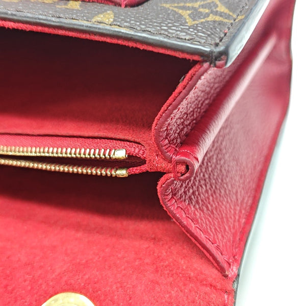 VICTOIRE Monogram Coated Canvas Brown