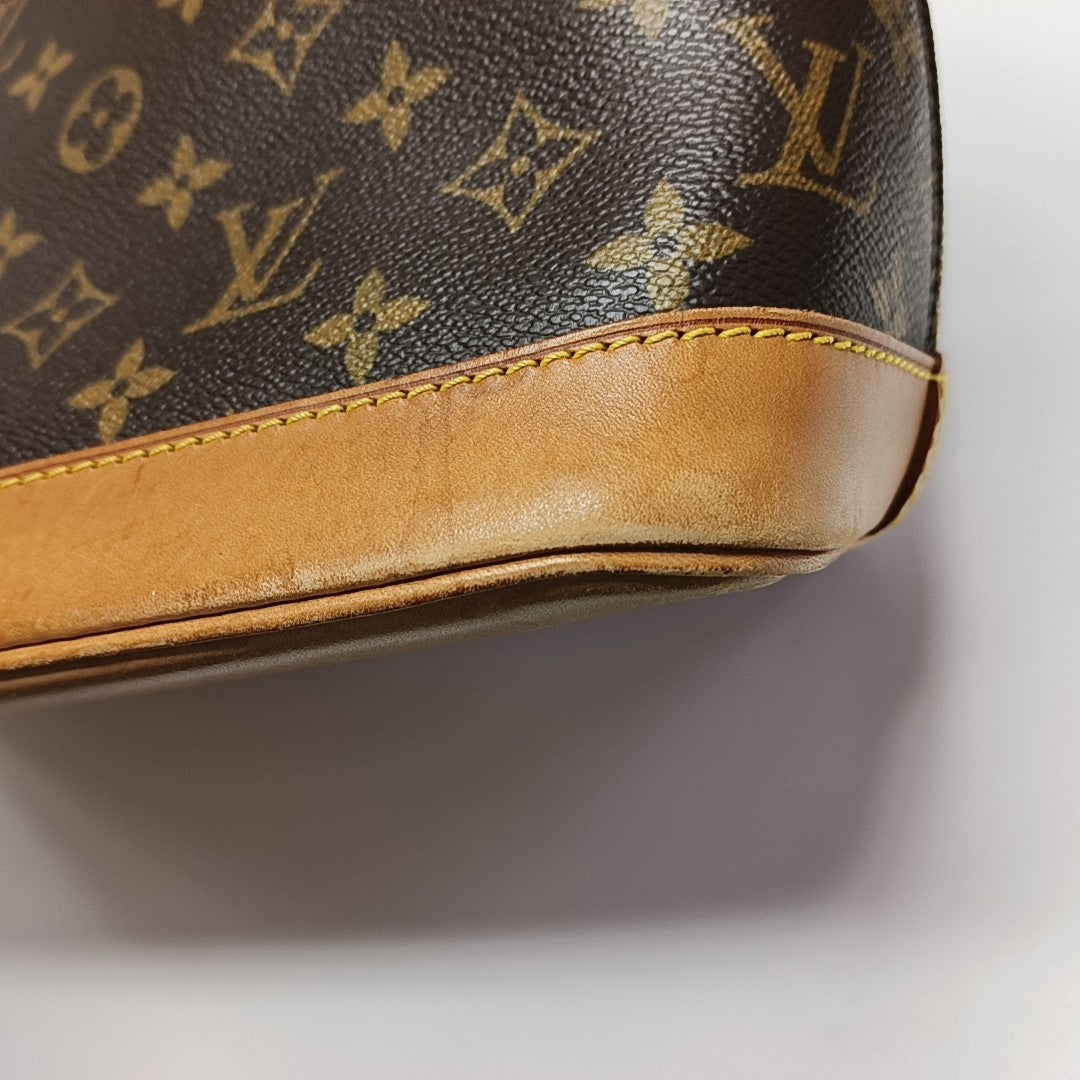 ALMA PM Monogram Coated Canvas Brown