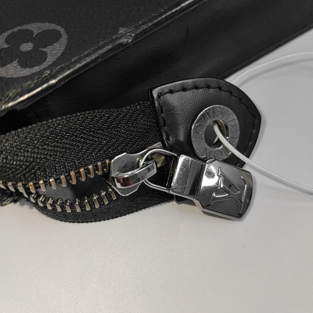 Pochette Voyag MM Monogram Coated Canvas Black