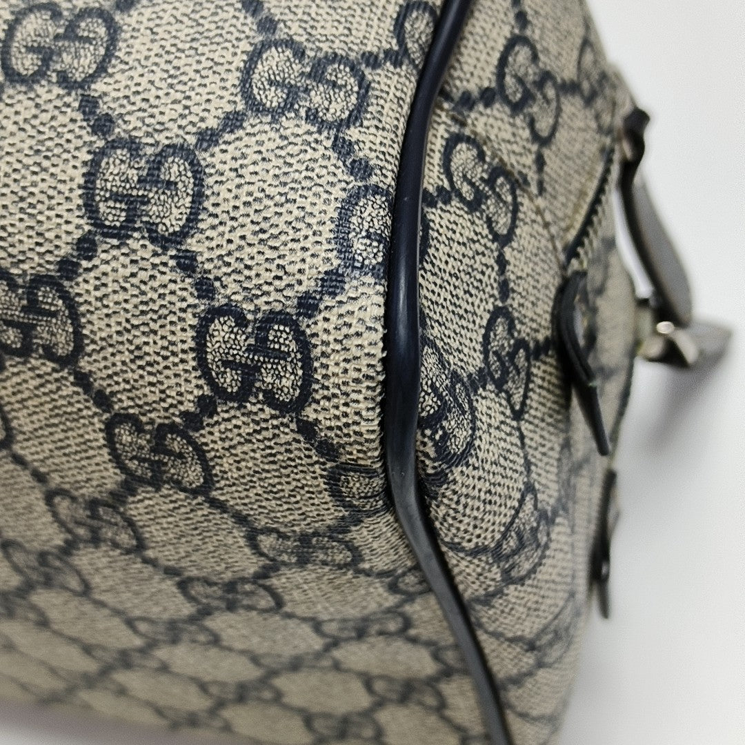 Monogram Coated Canvas Clutch Black