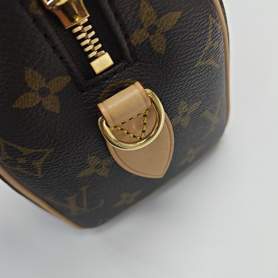 SPEEDY 20 Monogram Coated Canvas Brown