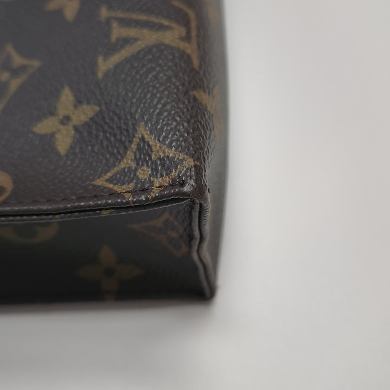TOILET POCKET 26 Monogram Coated Canvas Brown