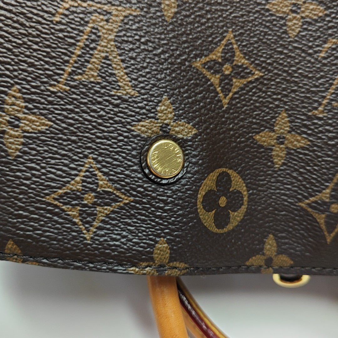 MONTAIGNE Monogram Coated Canvas Brown