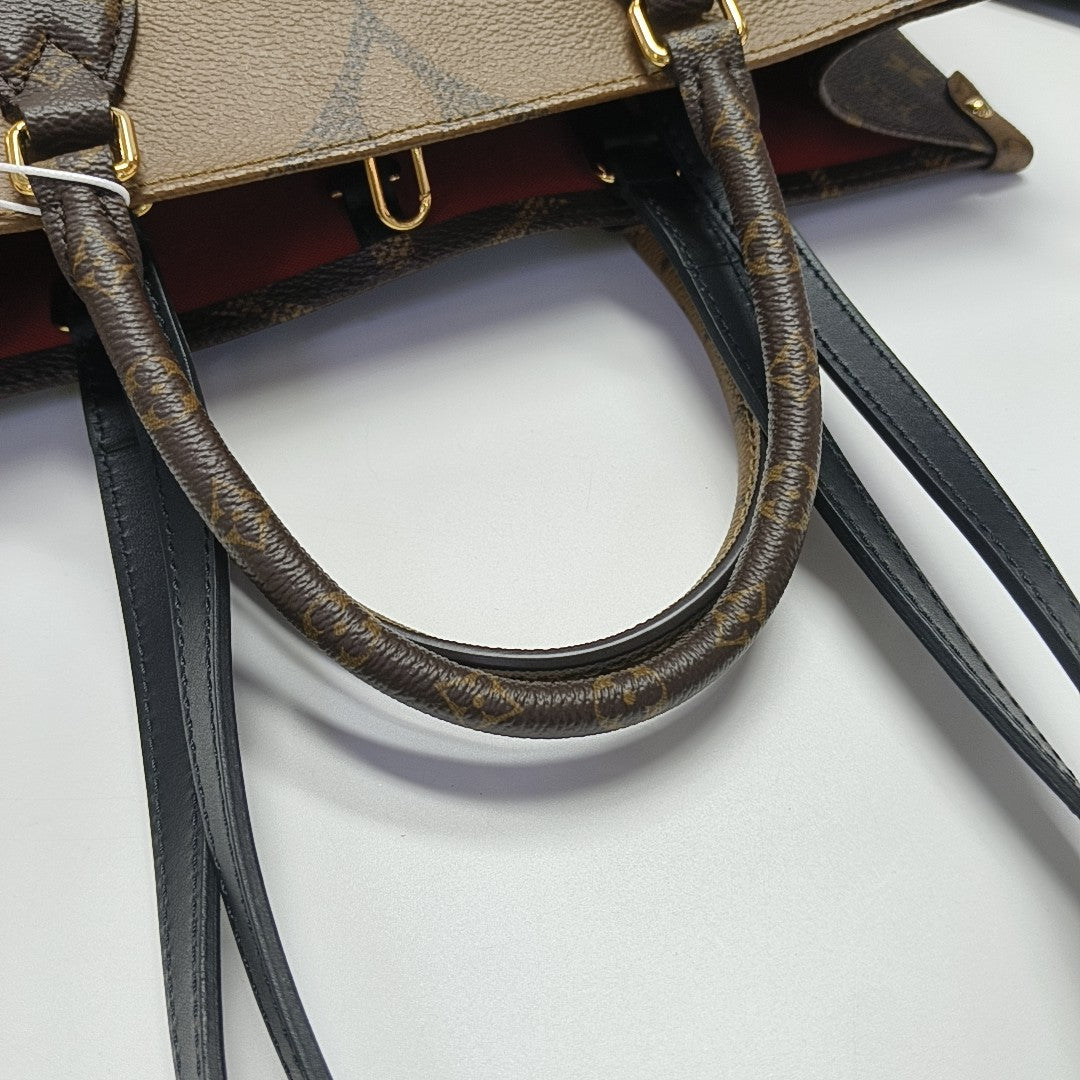 ONTHEGO MM Monogram Coated Canvas Brown