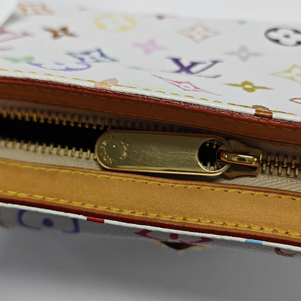 LV × TM ELIZA Monogram Coated Canvas White