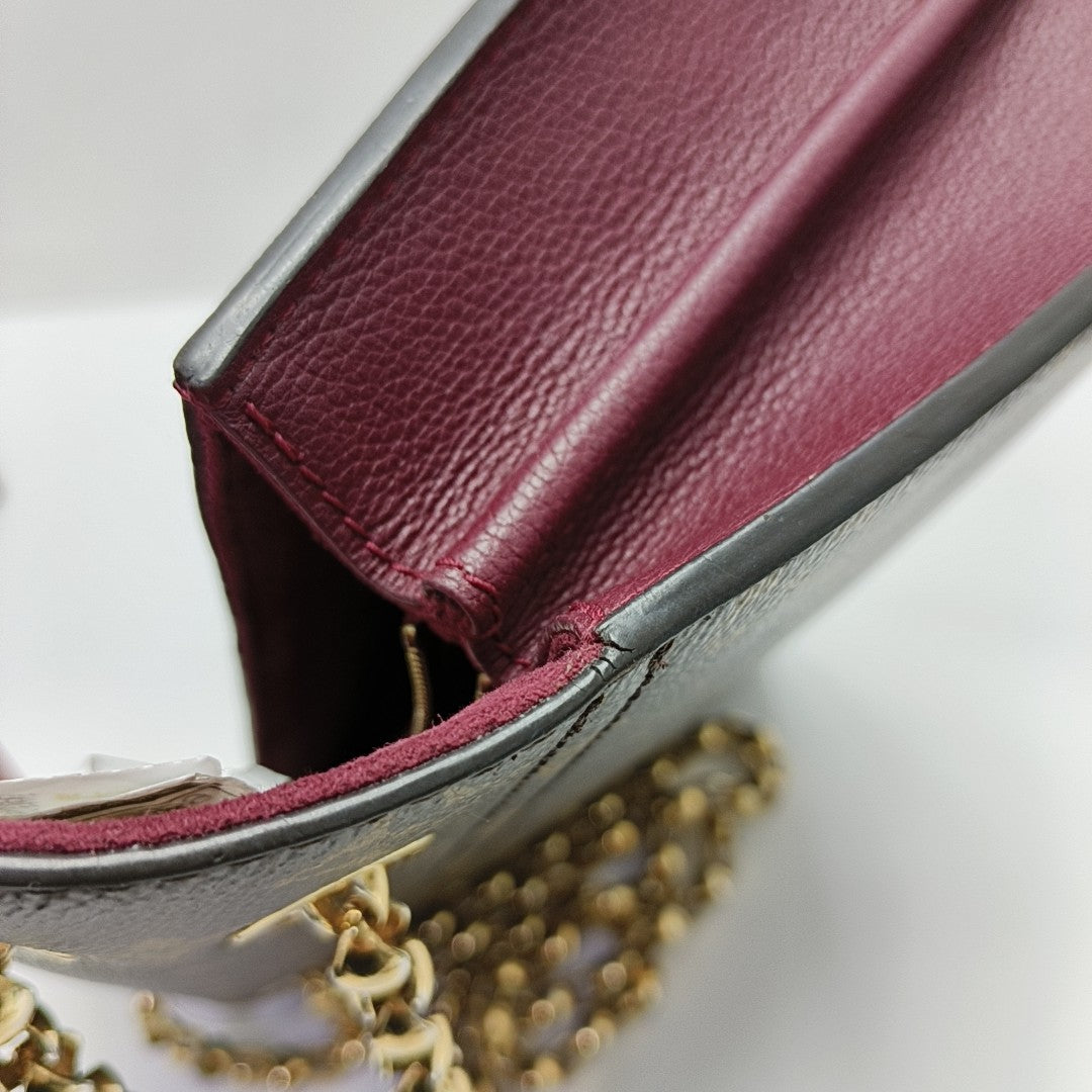 VICTOIRE Monogram Coated Canvas Brown