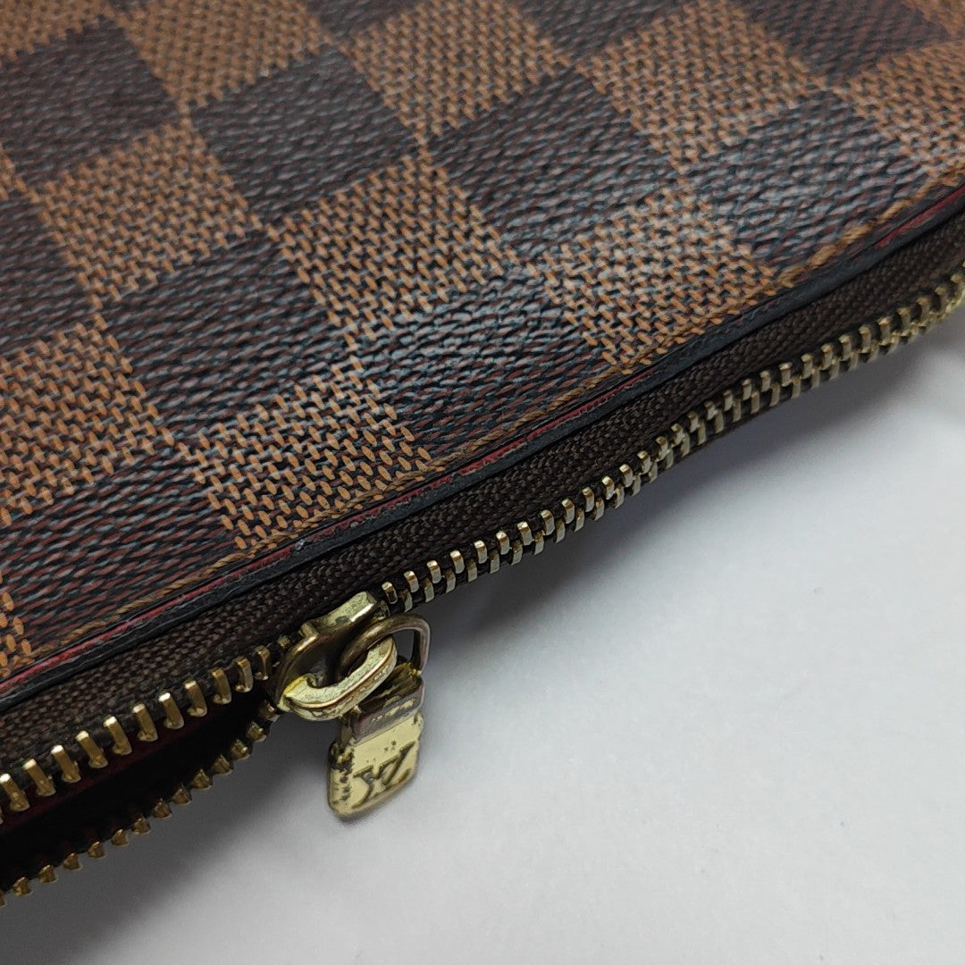 Damier Ebene Coated Canvas Clutch Brown