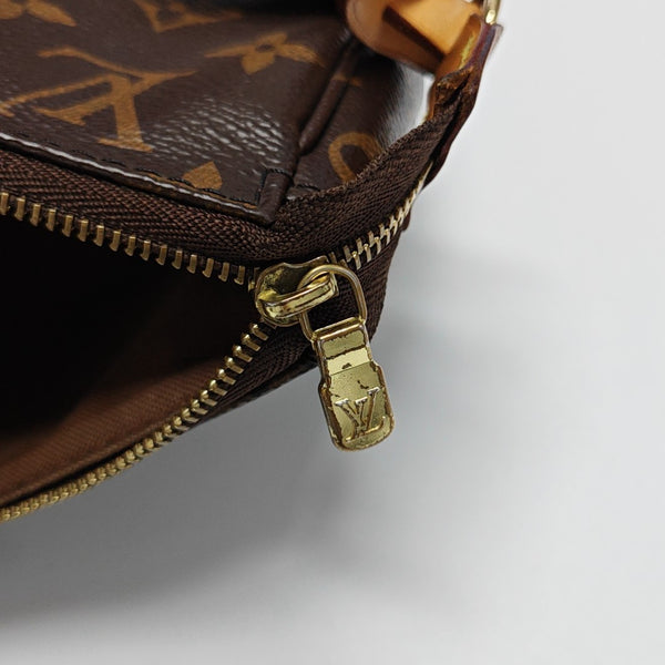 ACCESSOIRES GM Monogram Coated Canvas Brown