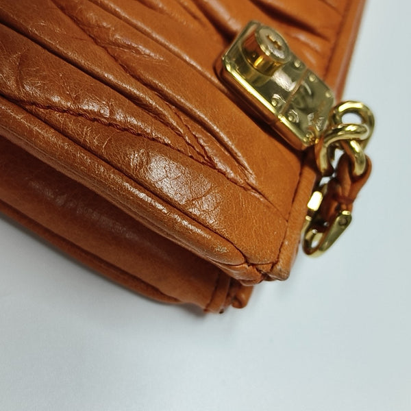 Quilted Lambskin Clutch Orange