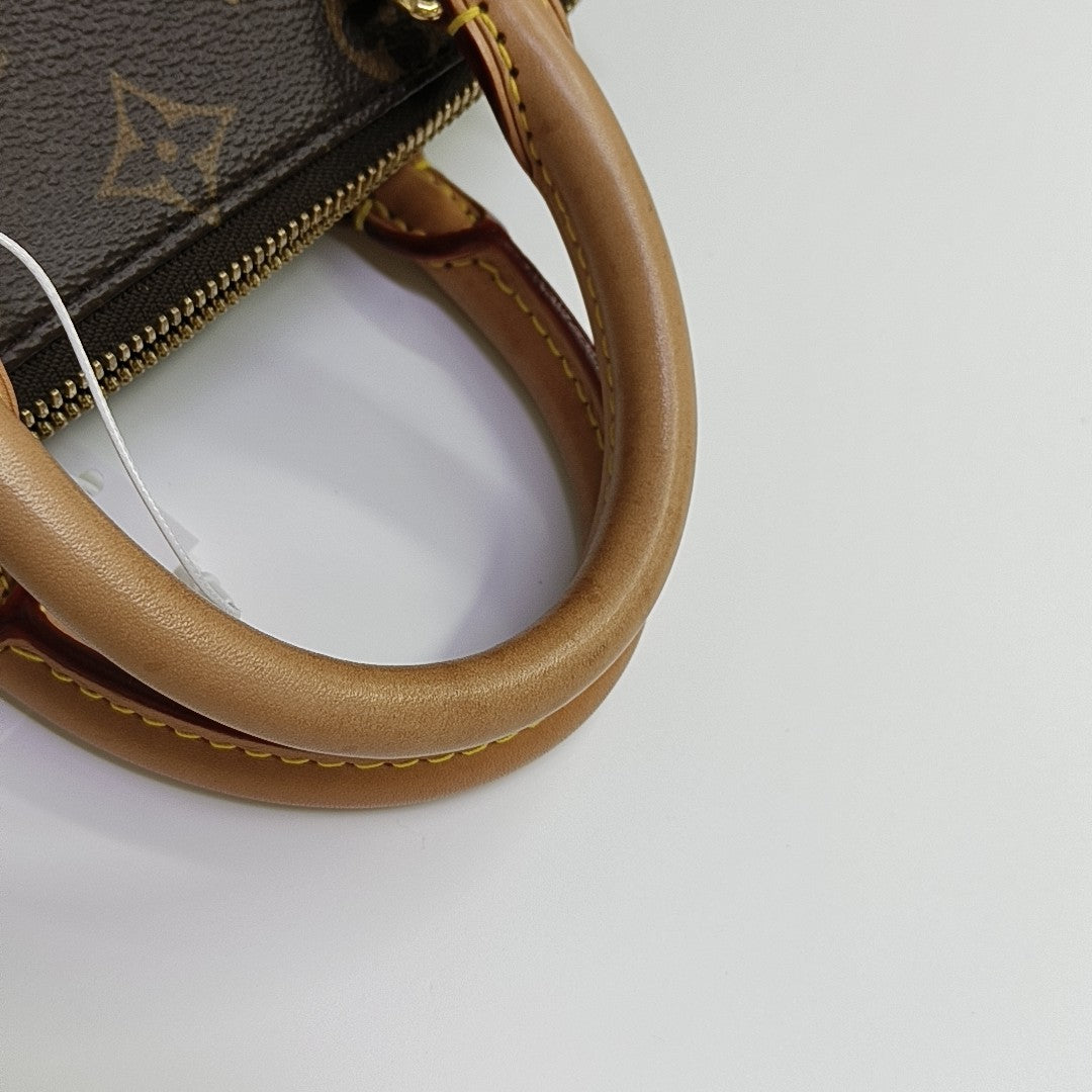 SPEEDY 20 Monogram Coated Canvas Brown