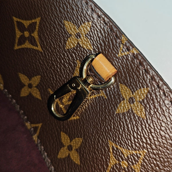 MONTAIGNE GM Monogram Coated Canvas Brown