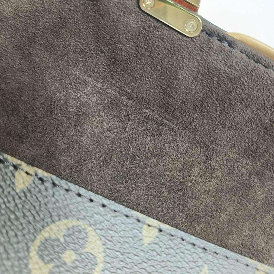Pochette Camille Monogram Coated Canvas Brown