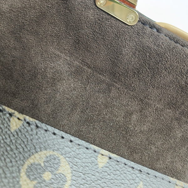 Pochette Camille Monogram Coated Canvas Brown