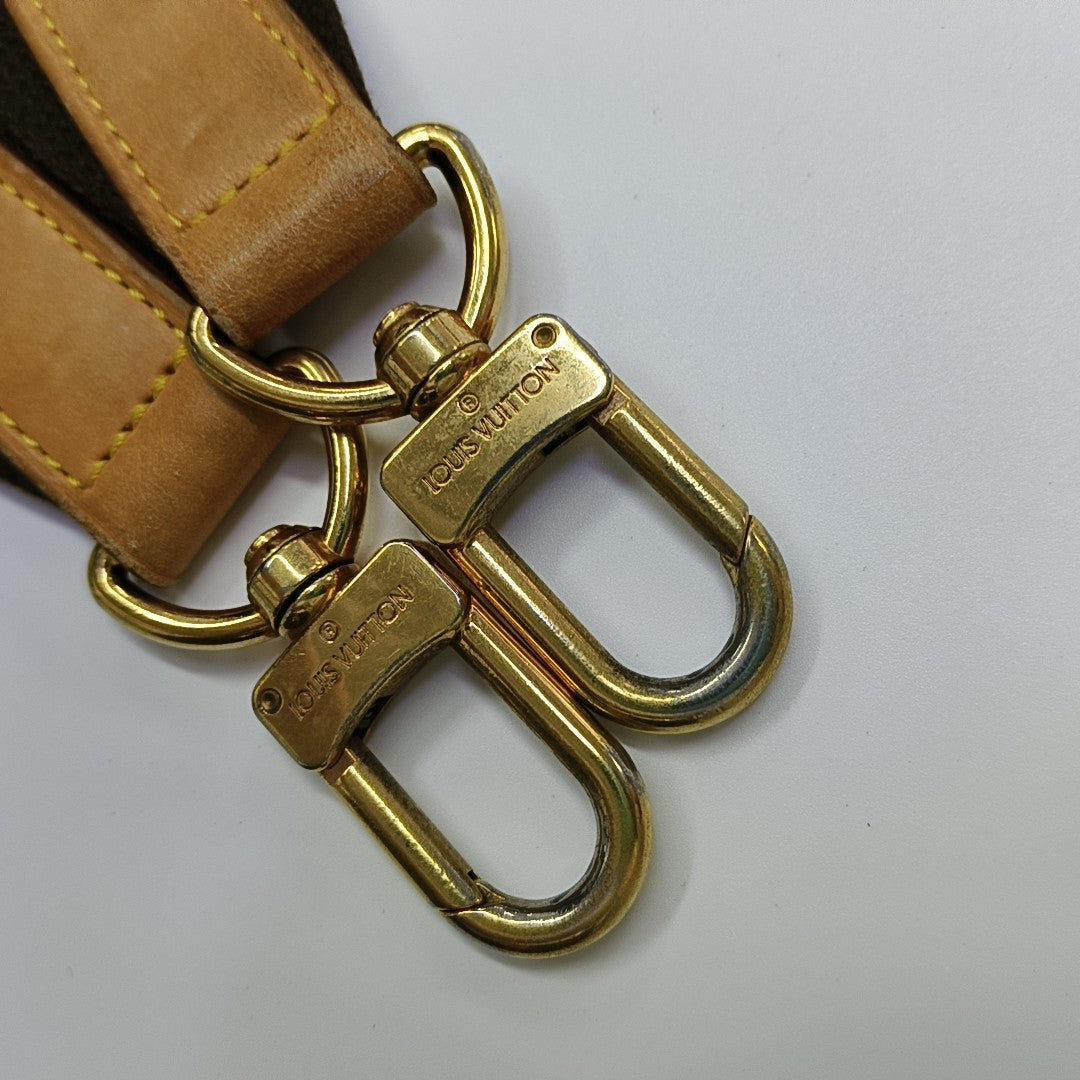 ICARE Monogram Coated Canvas Brown