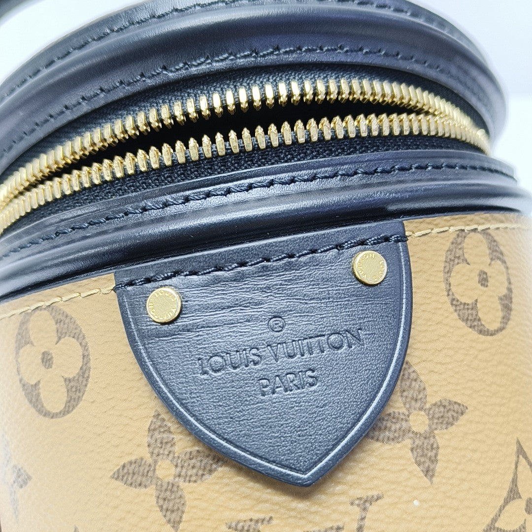 CANNES PM Monogram Coated Canvas Brown