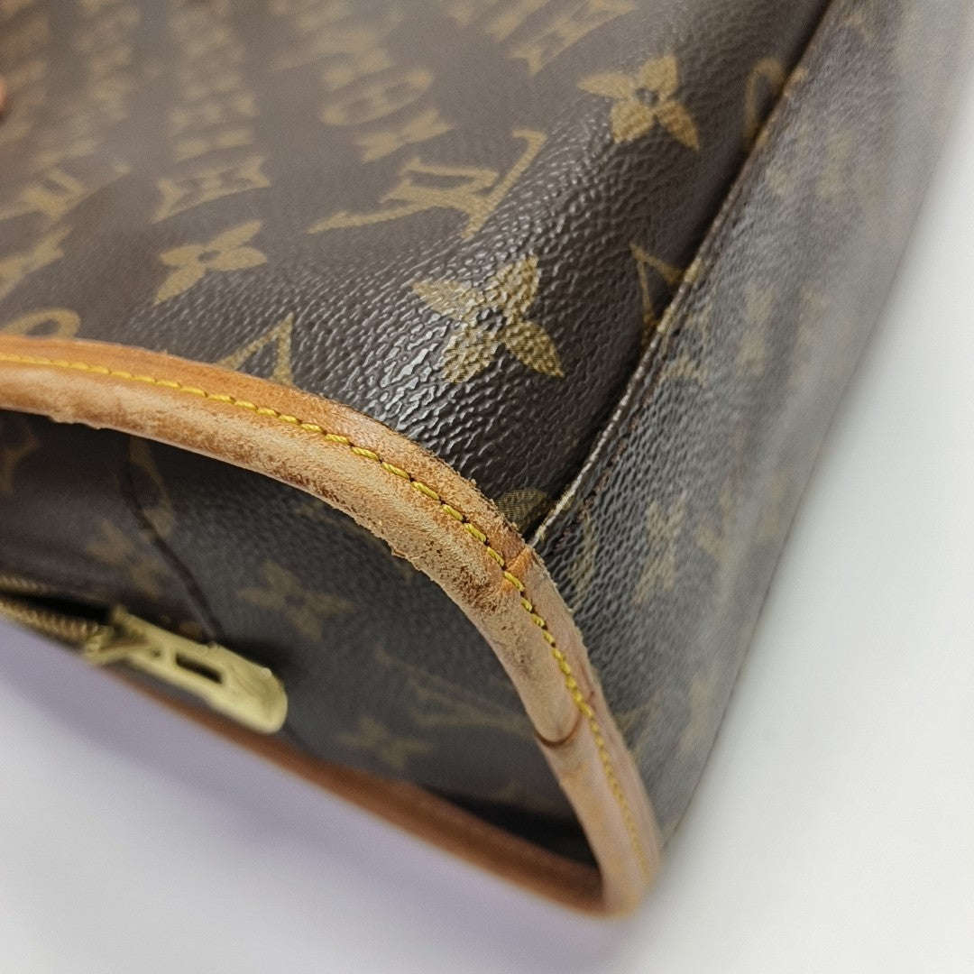 VINTAGE RIVOLI Monogram Coated Canvas Brown