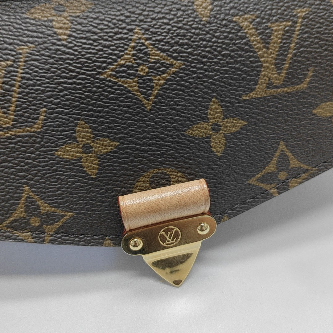 MÉTIS EAST WEST Monogram Coated Canvas Brown
