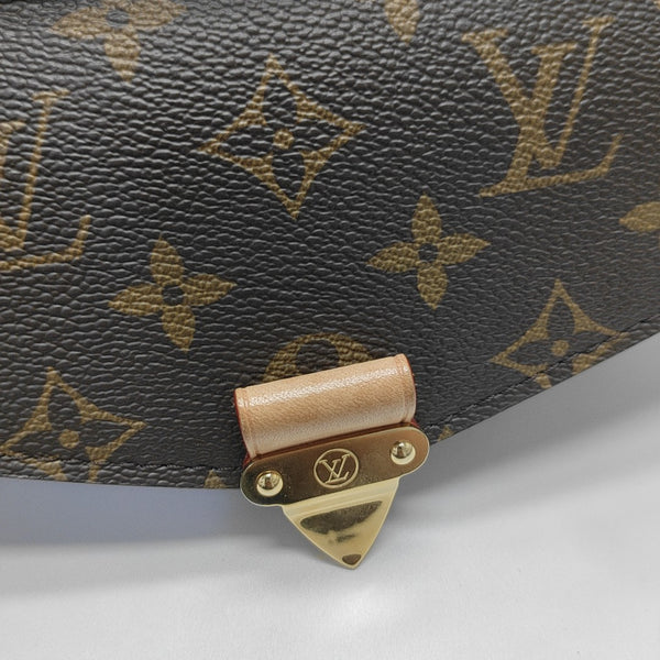MÉTIS EAST WEST Monogram Coated Canvas Brown