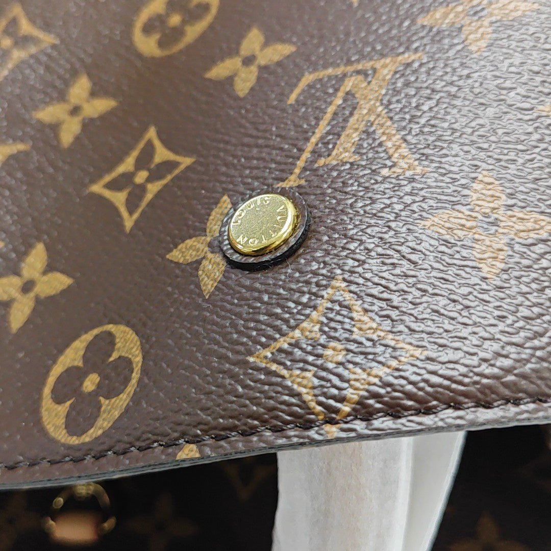 MONTAIGNE Monogram Coated Canvas Brown