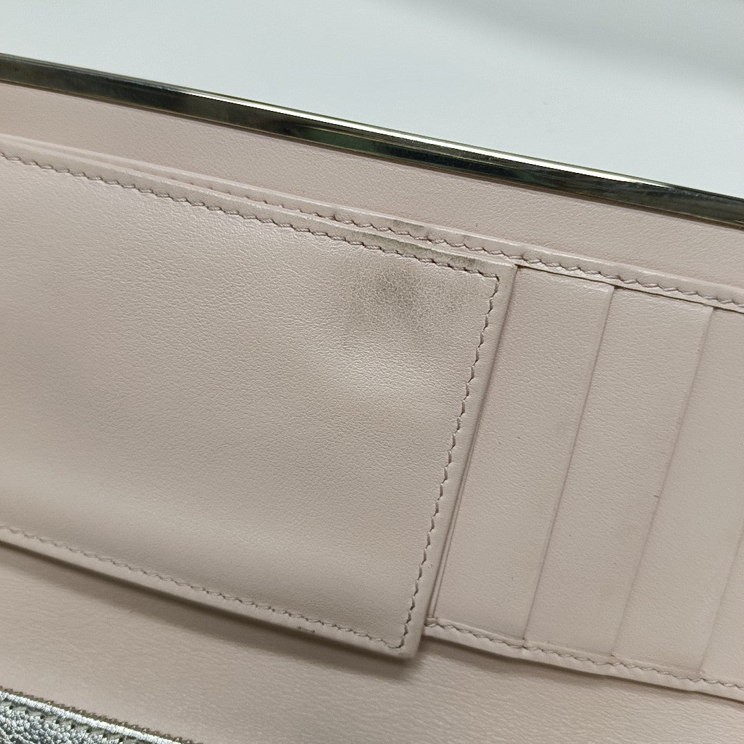 Authenticated pre-owned  Gancini Calfskin Silver Wallet - Wallet at Looply