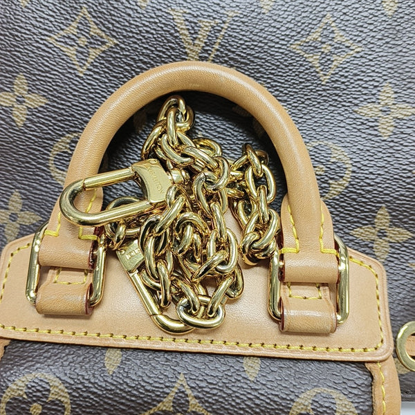 EXCURSION PM Monogram Coated Canvas Brown