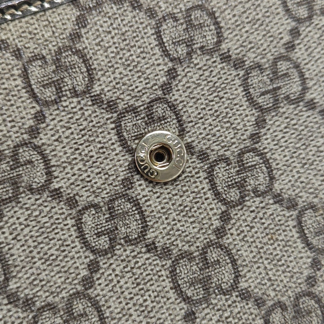 Monogram Coated Canvas Wallet Brown