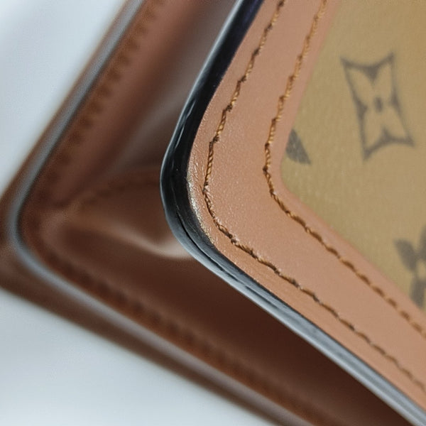 DAUPHINE MM Monogram Coated Canvas Brown