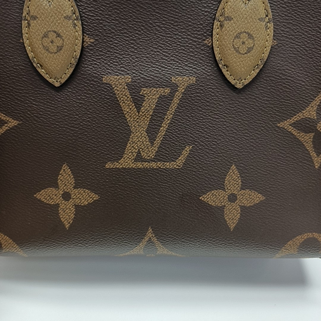 ONTHEGO PM Monogram Coated Canvas Brown