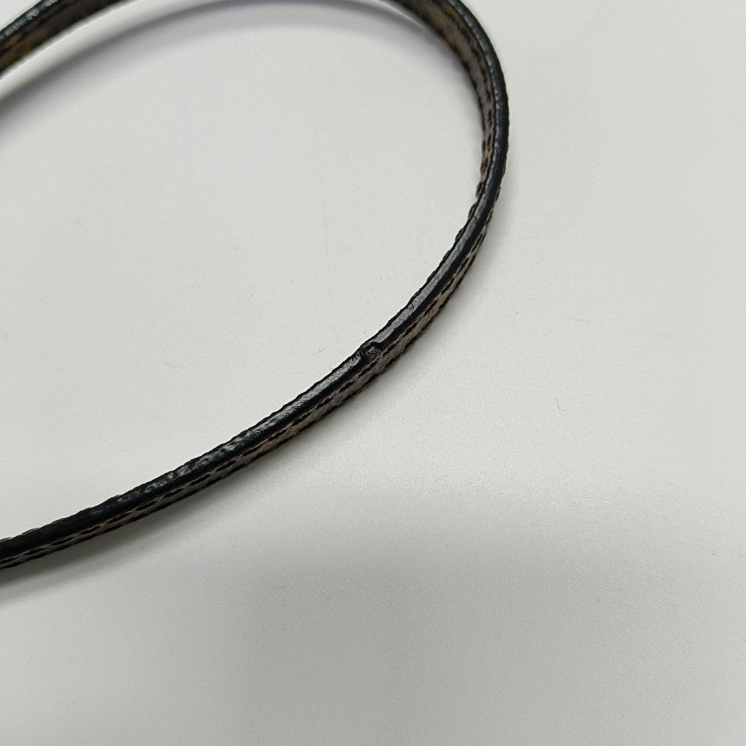 PETITE MALLE Monogram Coated Canvas Brown