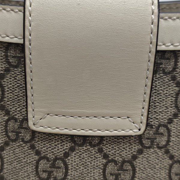 Padlock Small Monogram Coated Canvas Beige