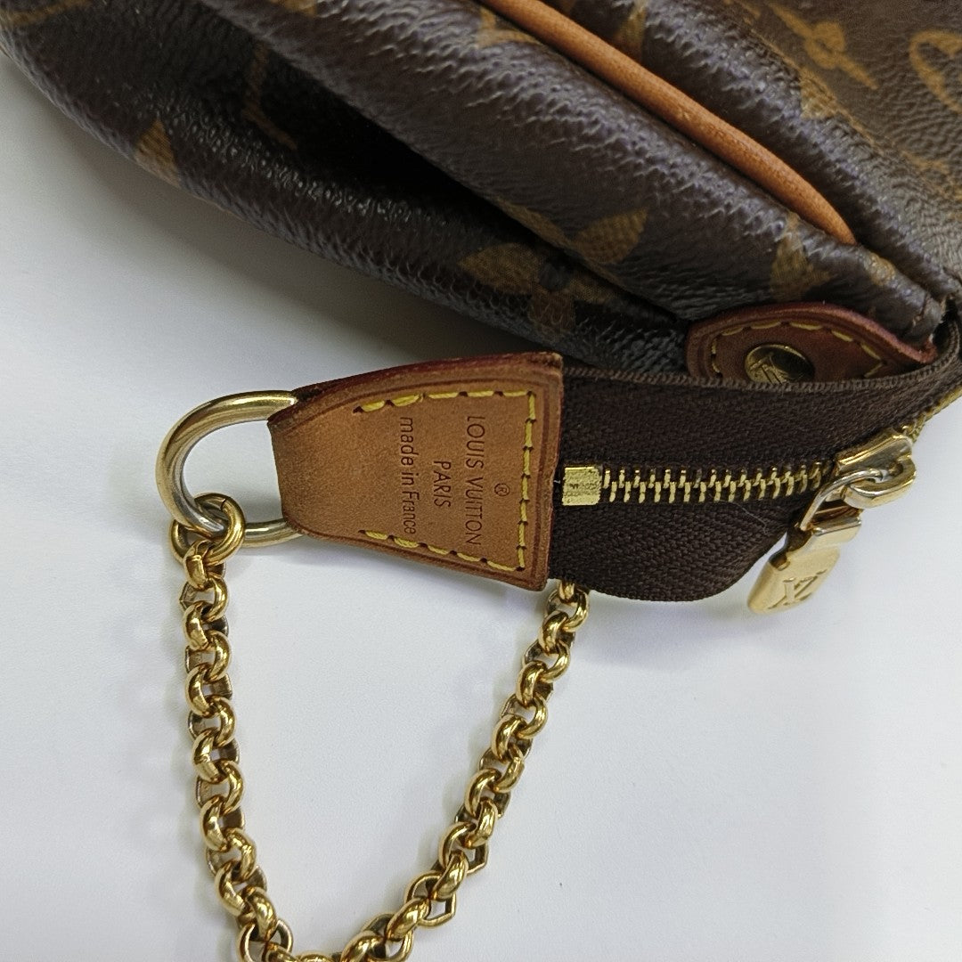 EVA Monogram Coated Canvas Brown