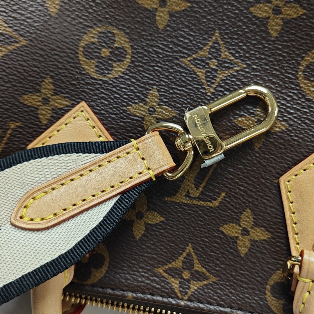 SPEEDY 20 Monogram Coated Canvas Brown