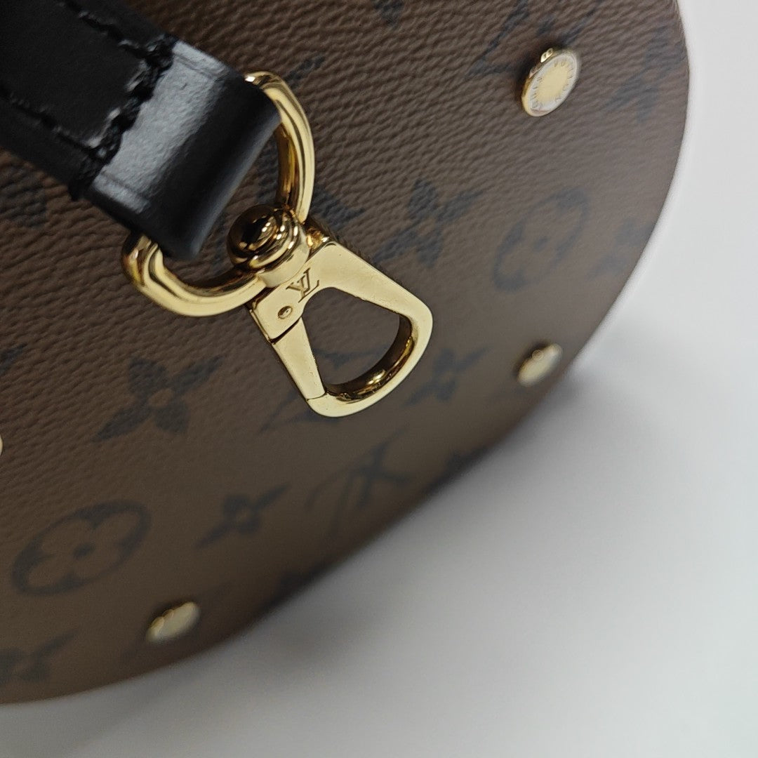 CANNES PM Monogram Coated Canvas Brown