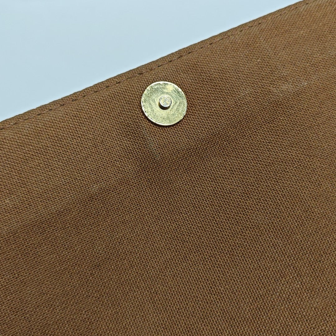 LOOPING PM Monogram Coated Canvas Brown