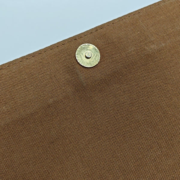 LOOPING PM Monogram Coated Canvas Brown