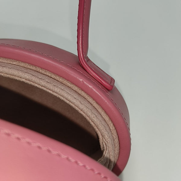 Authenticated pre-owned  TRIOMPHE Calfskin Pink - Top Handle Bag at Looply