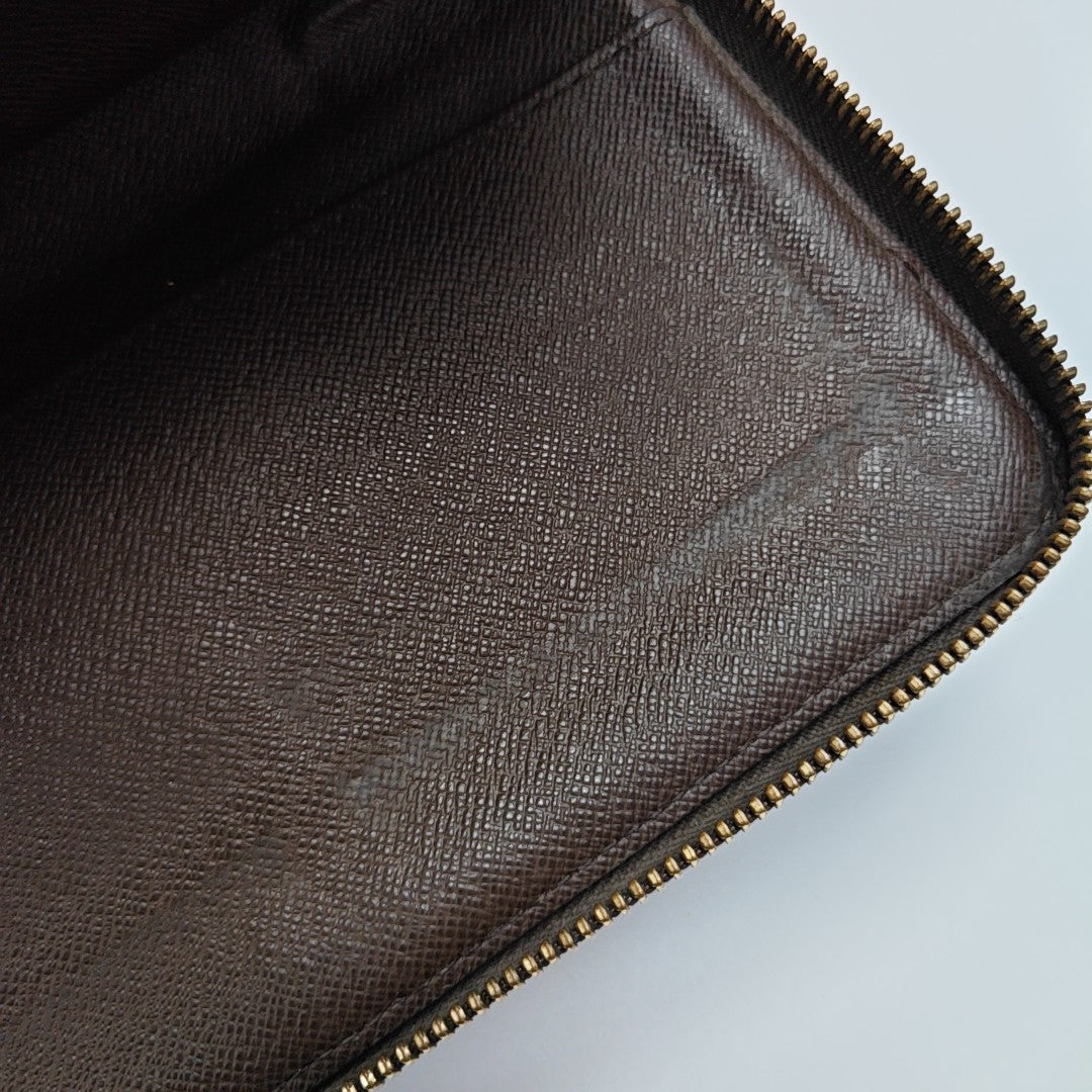 ZIPPY Damier Ebene Coated Canvas Brown Wallet
